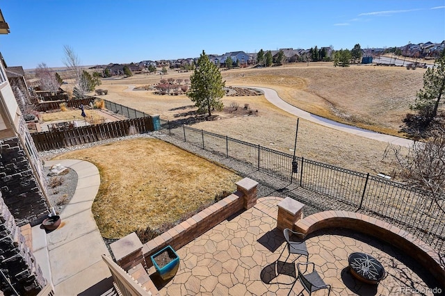 view of yard featuring a patio and fence