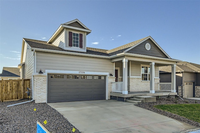 view of front of property featuring covered porch