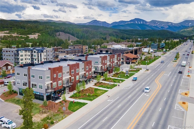 drone / aerial view featuring a mountain view