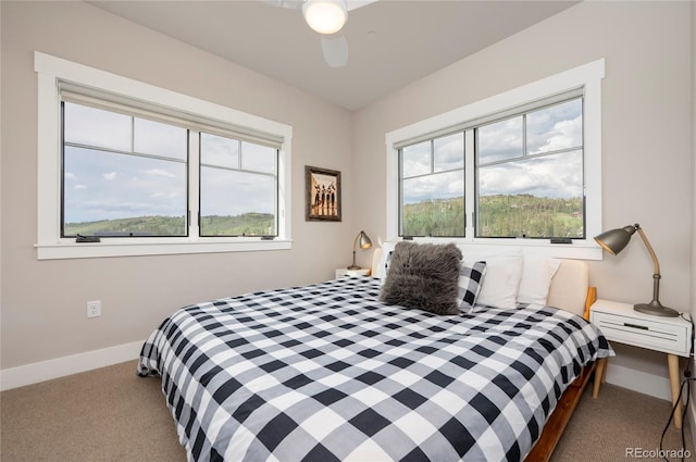 bedroom with carpet flooring and ceiling fan