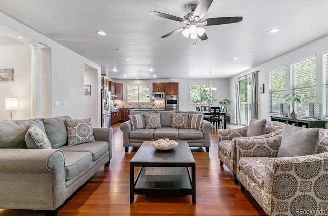 25402 E Glasgow Pl, Aurora, CO 80016 - living room with recessed lighting, dark wood-type flooring, and a ceiling fan
