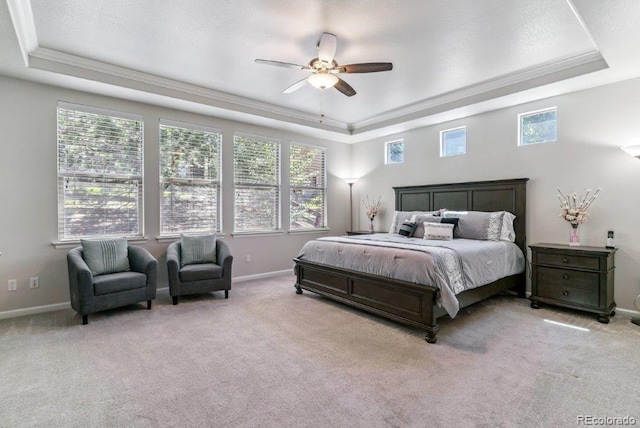 25402 E Glasgow Pl, Aurora, CO 80016 - bedroom with a raised ceiling, ornamental molding, multiple windows, and carpet flooring