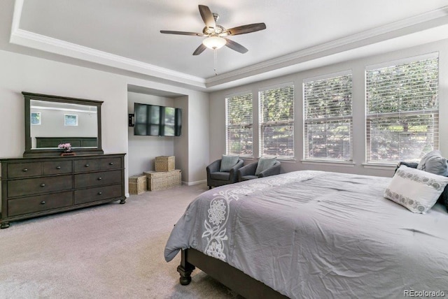25402 E Glasgow Pl, Aurora, CO 80016 - bedroom featuring a tray ceiling, carpet flooring, crown molding, and a ceiling fan