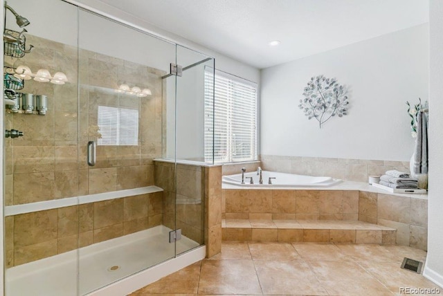 25402 E Glasgow Pl, Aurora, CO 80016 - bathroom with a bath, tile patterned floors, and a stall shower