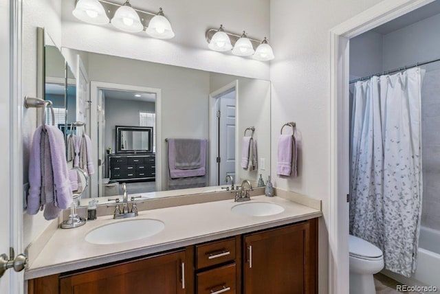25402 E Glasgow Pl, Aurora, CO 80016 - bathroom featuring double vanity and shower / bath combo