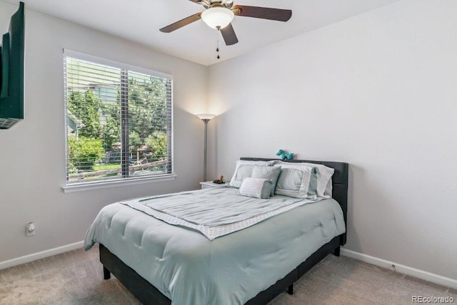 25402 E Glasgow Pl, Aurora, CO 80016 - carpeted bedroom with baseboards and ceiling fan