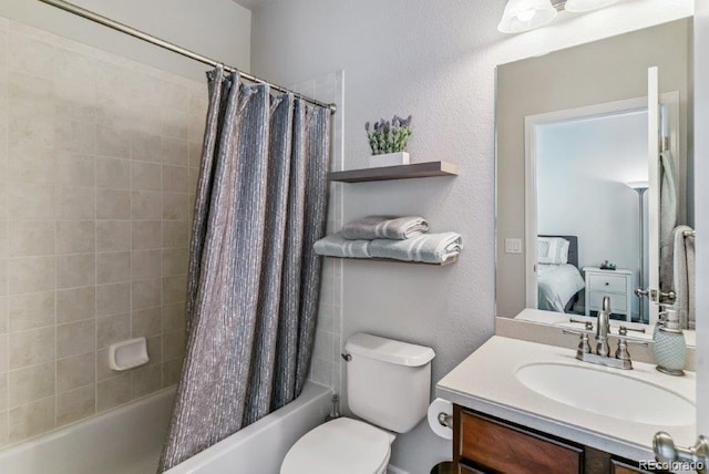 25402 E Glasgow Pl, Aurora, CO 80016 - bathroom featuring shower / tub combo with curtain, vanity, and a textured wall