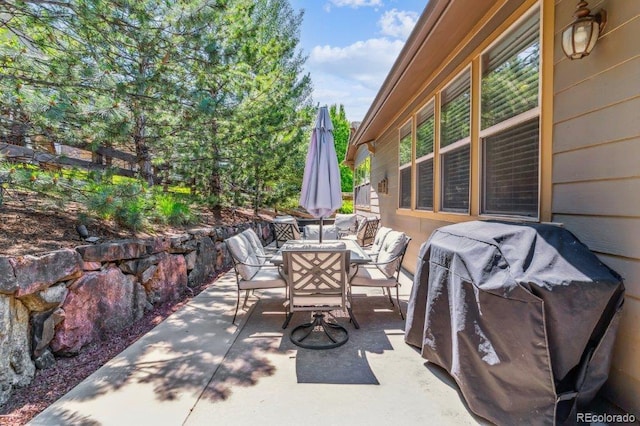 25402 E Glasgow Pl, Aurora, CO 80016 - view of patio / terrace featuring outdoor dining space and grilling area