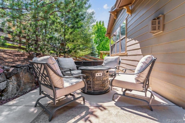 25402 E Glasgow Pl, Aurora, CO 80016 - view of patio / terrace with an outdoor fire pit