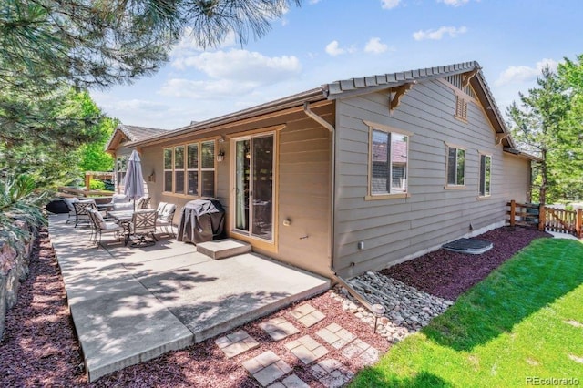 25402 E Glasgow Pl, Aurora, CO 80016 - back of property featuring a patio area