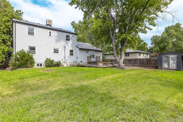 7431 Webster St, Arvada, CO 80003 - back of property featuring a wooden deck