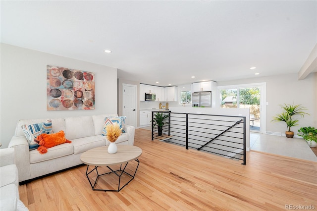 living room featuring light wood-type flooring