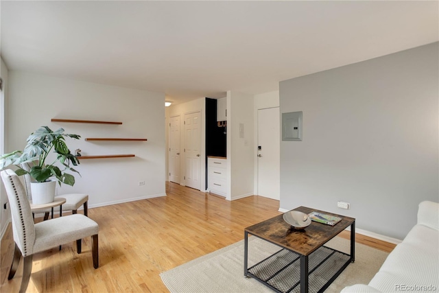 21 N Washington St Unit 301, Denver, CO 80203 - living area featuring electric panel and light wood finished floors