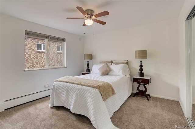 21 N Washington St Unit 301, Denver, CO 80203 - carpeted bedroom with baseboard heating, ceiling fan, and a closet