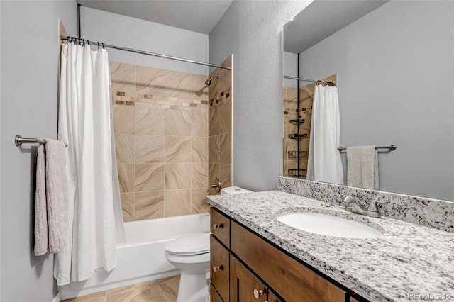 full bathroom featuring vanity, shower / bathtub combination with curtain, and toilet