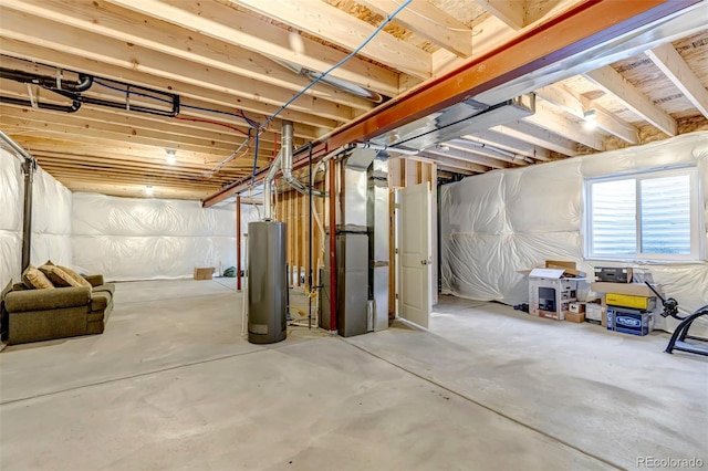 basement featuring gas water heater and heating unit