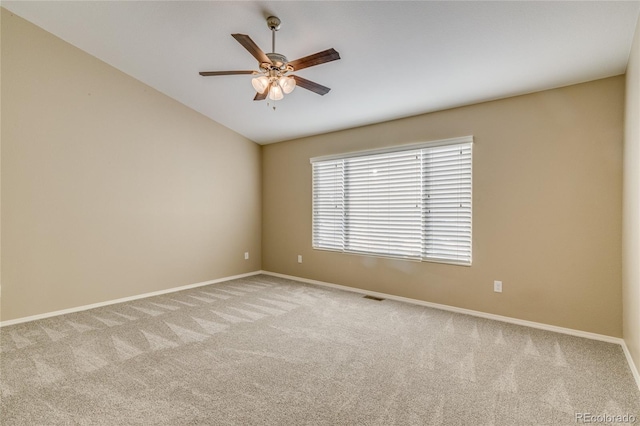 carpeted empty room with ceiling fan