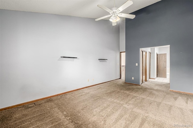 4207 S Granby Ct Unit A, Aurora, CO 80014 - carpeted empty room with a high ceiling and a ceiling fan
