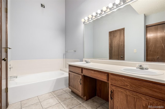 4207 S Granby Ct Unit A, Aurora, CO 80014 - full bath with double vanity, tile patterned floors, and a bath