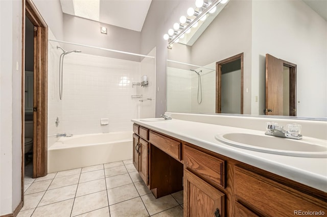 4207 S Granby Ct Unit A, Aurora, CO 80014 - full bathroom featuring double vanity,  shower combination, tile patterned floors, and a skylight