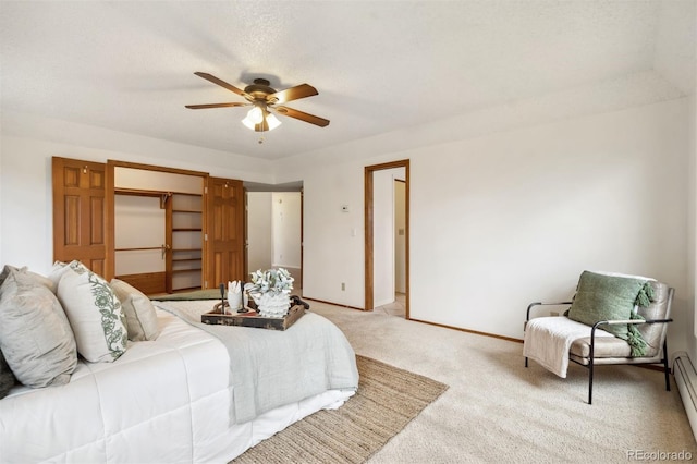14536 Latrobe Dr, Colorado Springs, CO 80921 - bedroom with light colored carpet, a baseboard heating unit, baseboards, and a ceiling fan
