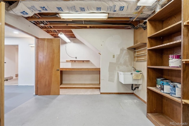 14536 Latrobe Dr, Colorado Springs, CO 80921 - unfinished below grade area featuring baseboards and a sink