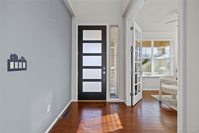 entrance foyer featuring ceiling fan and dark hardwood / wood-style flooring