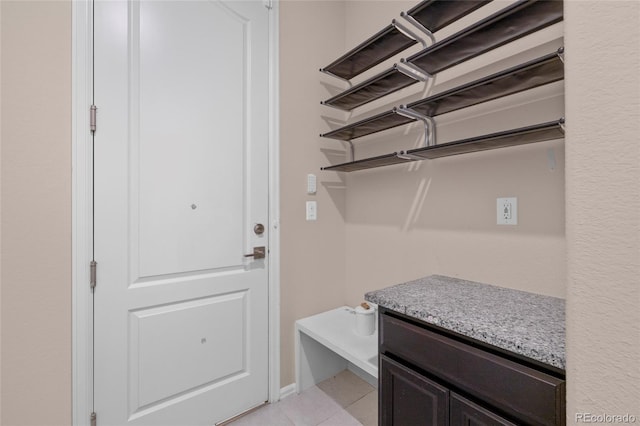 interior space with light tile patterned floors