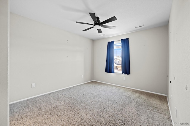 unfurnished room featuring carpet and ceiling fan