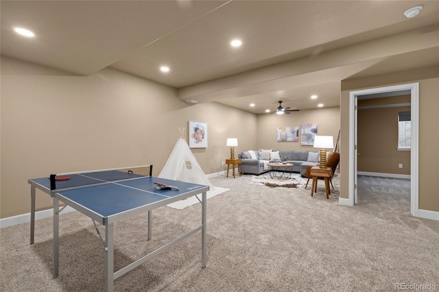 rec room featuring carpet flooring and ceiling fan