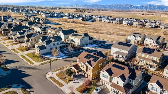 birds eye view of property featuring a mountain view