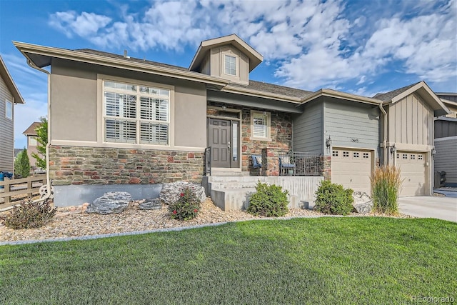 view of front of property featuring an attached garage, stone siding, concrete driveway, and a front yard