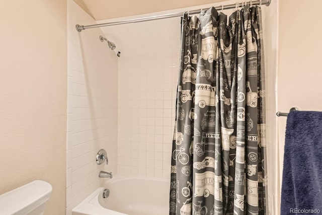 full bath featuring toilet and shower / bath combo with shower curtain