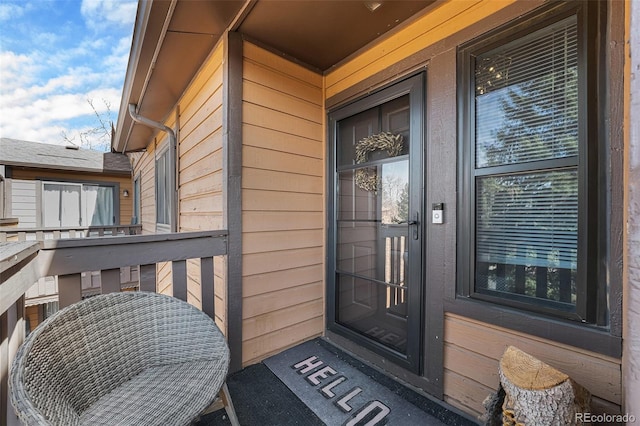 entrance to property with a balcony