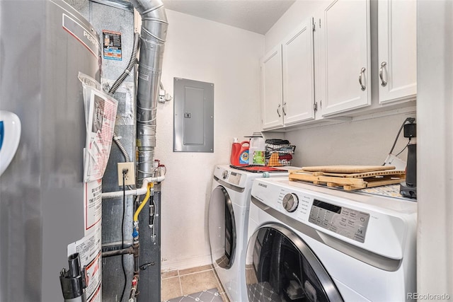 laundry room with washing machine and clothes dryer, electric panel, cabinet space, light tile patterned flooring, and gas water heater