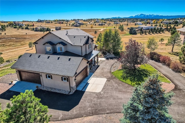 bird's eye view with a mountain view