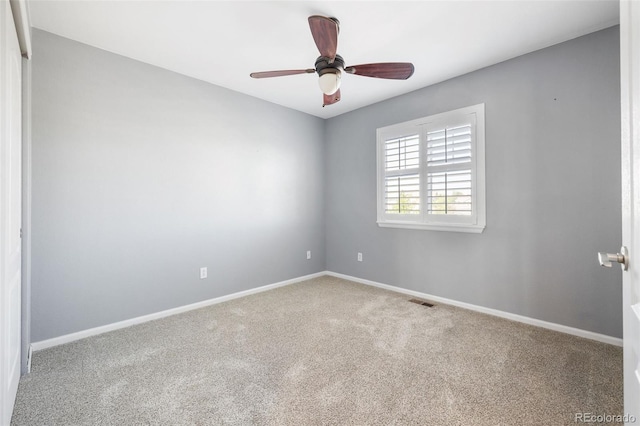 10978 Ashurst Ln, Highlands Ranch, CO 80130 - carpeted empty room with a ceiling fan and baseboards