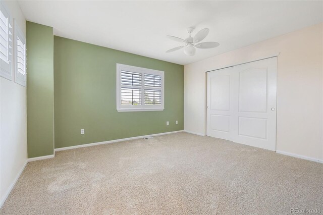 10978 Ashurst Ln, Highlands Ranch, CO 80130 - unfurnished bedroom featuring a closet, carpet, and ceiling fan