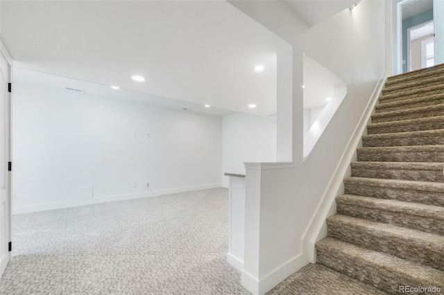 10978 Ashurst Ln, Highlands Ranch, CO 80130 - stairway with carpet flooring and recessed lighting
