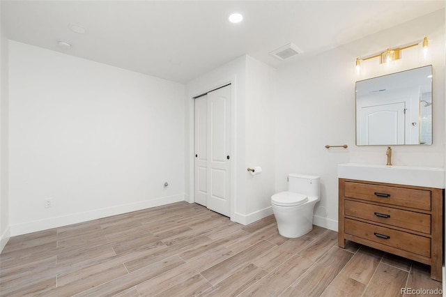 10978 Ashurst Ln, Highlands Ranch, CO 80130 - full bath with vanity and wood finished floors