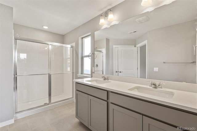 14249 Beebalm Ave, Parker, CO 80134 - full bath featuring a shower stall and double vanity