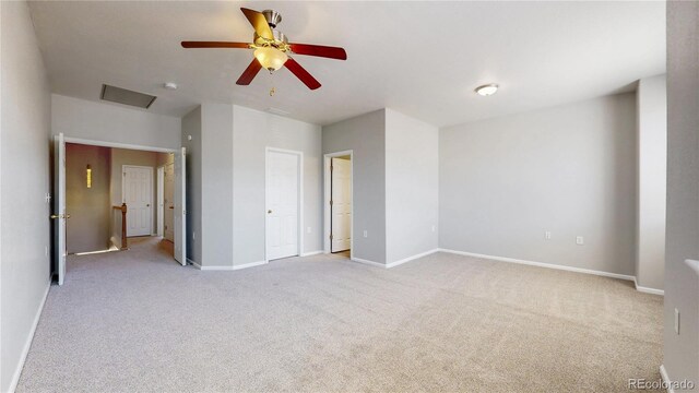 16047 E Geddes Ln Unit 128, Aurora, CO 80016 - unfurnished bedroom featuring carpet, baseboards, a ceiling fan, and attic access