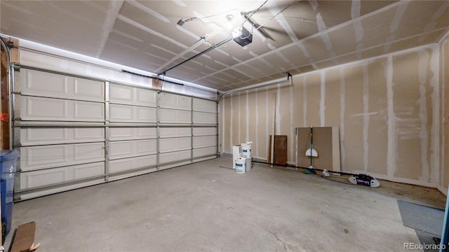 16047 E Geddes Ln Unit 128, Aurora, CO 80016 - garage featuring a garage door opener
