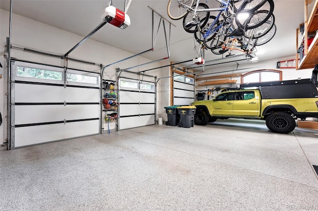 2548 Keystone Dr, Evergreen, CO 80439 - garage featuring a garage door opener