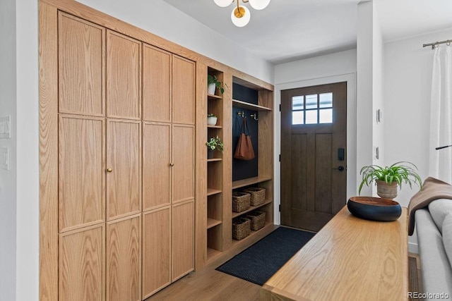 7633 S Gilpin Ct, Centennial, CO 80122 - mudroom with wood finished floors