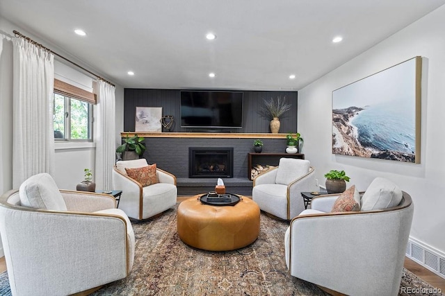 7633 S Gilpin Ct, Centennial, CO 80122 - living room with recessed lighting, wood finished floors, and a brick fireplace