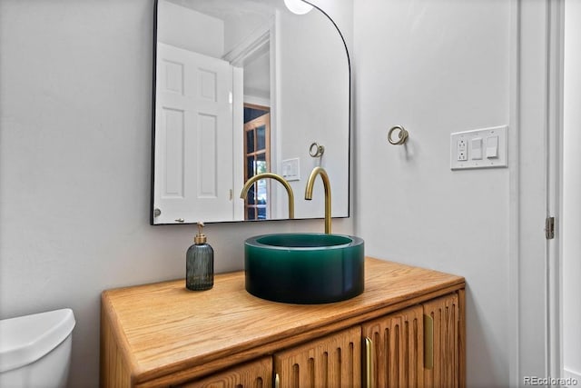 7633 S Gilpin Ct, Centennial, CO 80122 - bathroom featuring toilet and vanity