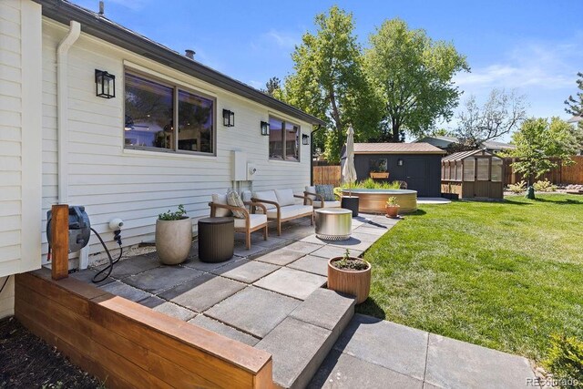 7633 S Gilpin Ct, Centennial, CO 80122 - view of patio / terrace with a hot tub