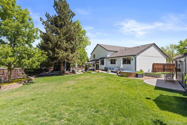 7633 S Gilpin Ct, Centennial, CO 80122 - view of yard with a hot tub and a patio