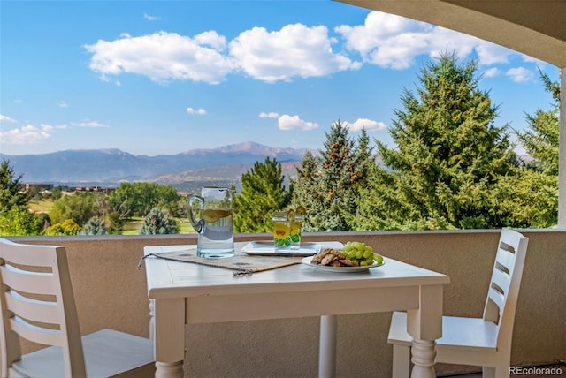 balcony featuring a mountain view